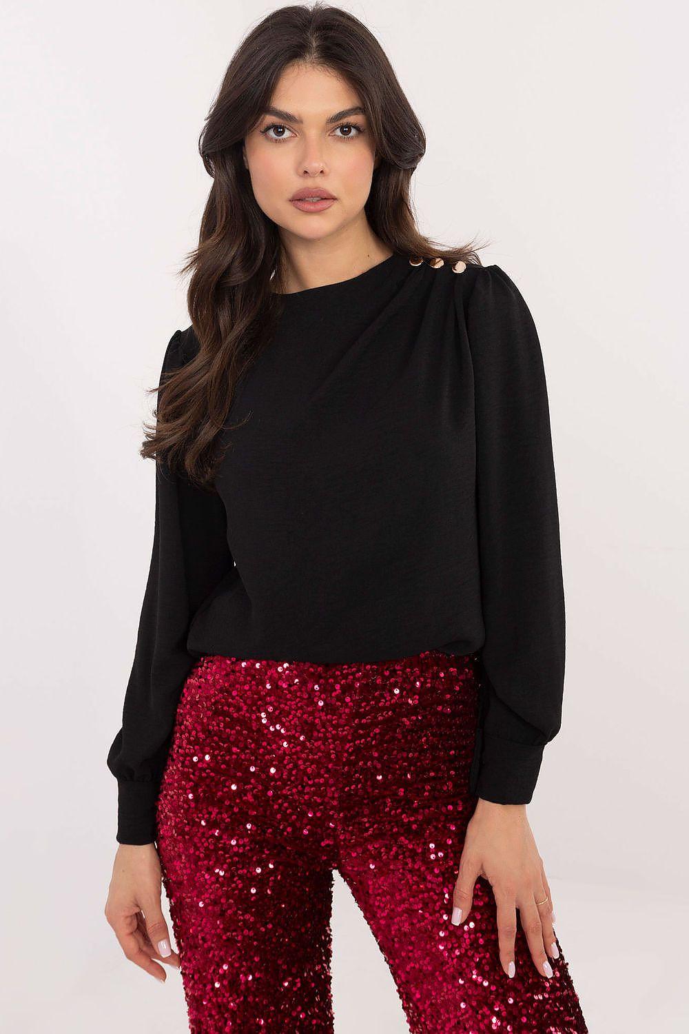 Black blouse with high neckline, gathered shoulders, and long puff sleeves
