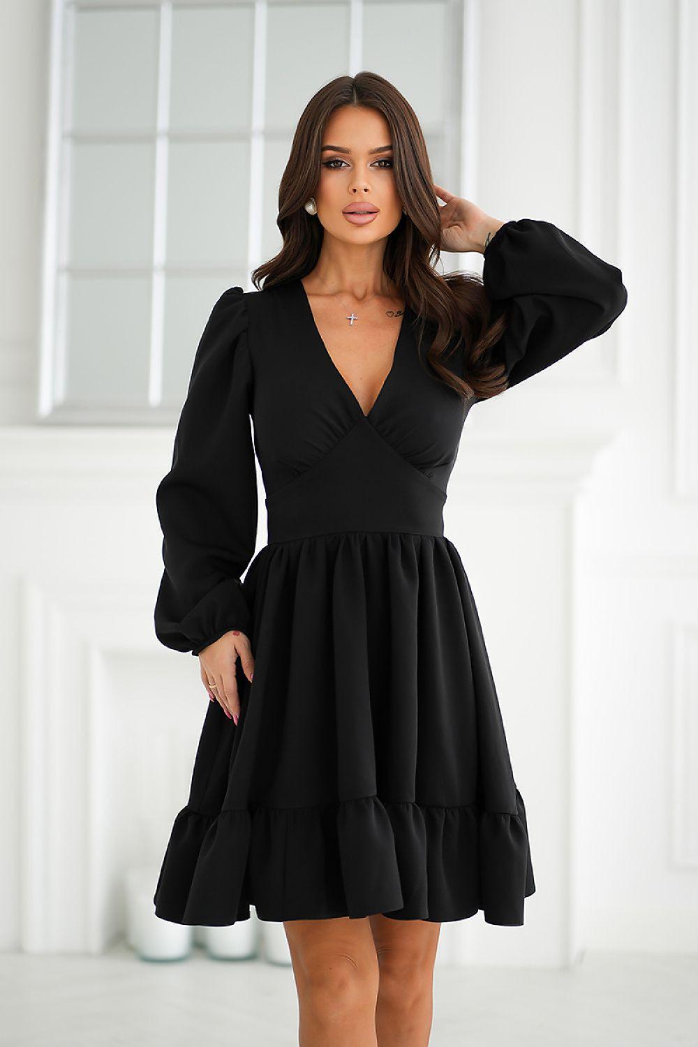 Black long sleeve cocktail dress with V-neck and tiered ruffle skirt