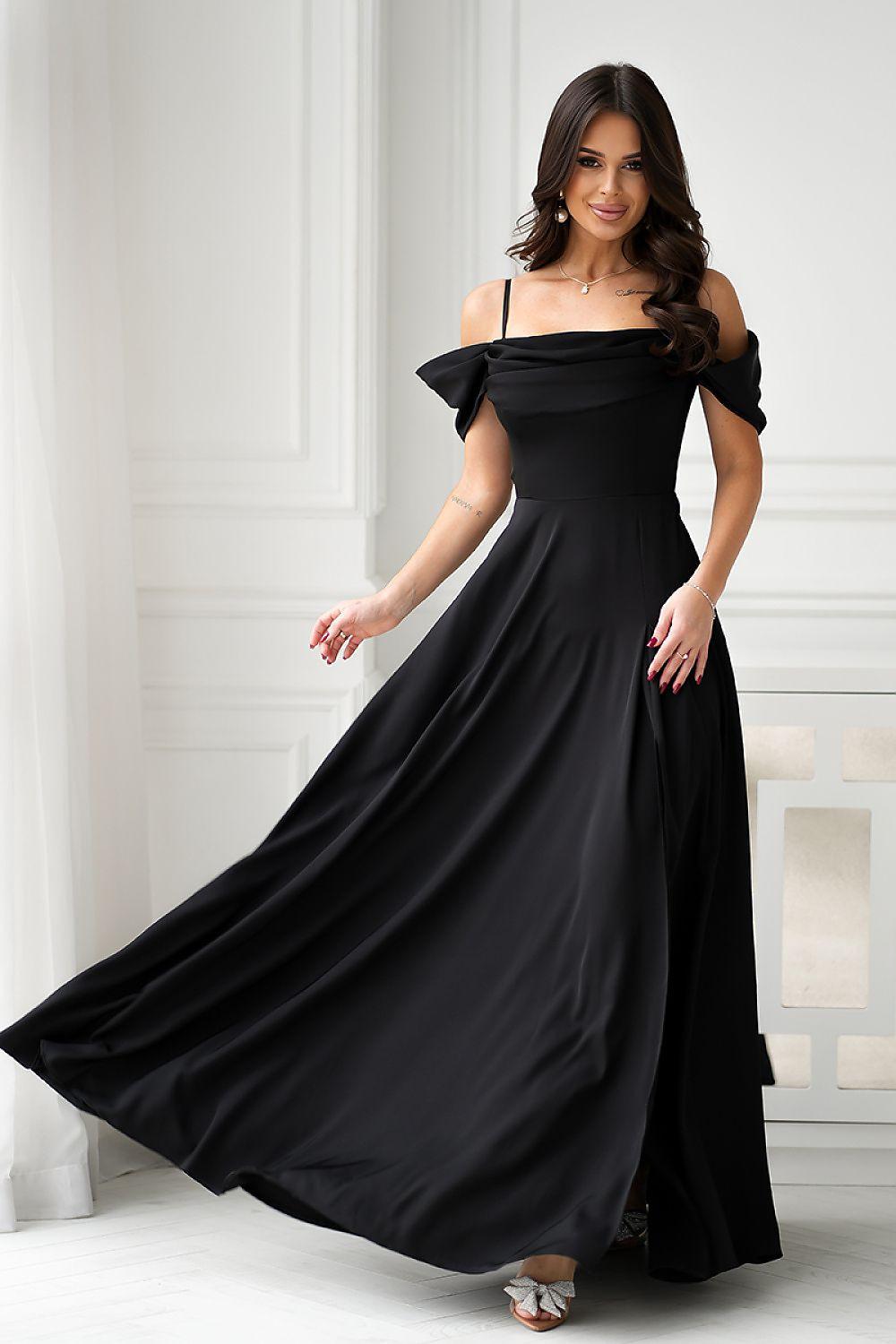 Off-shoulder black maxi dress with short puff sleeves and flowing A-line skirt