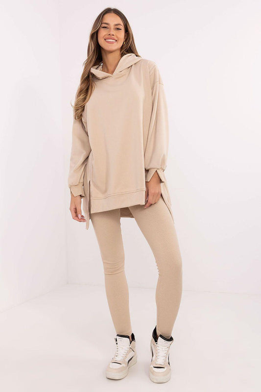 Beige hoodie and leggings set with hood, long sleeves, and slim jogger-style fit