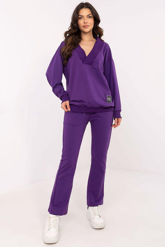 Violet two-piece tracksuit set with V-neck pullover and straight-leg pants.