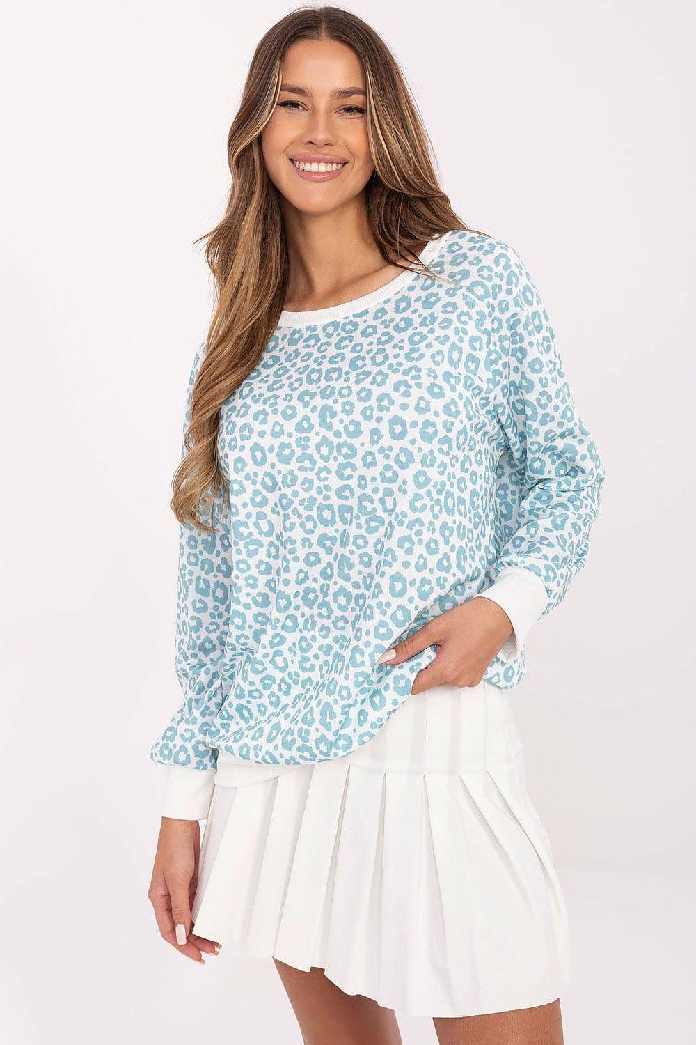 Blue animal print blouse with long sleeves and round neckline, loose fit