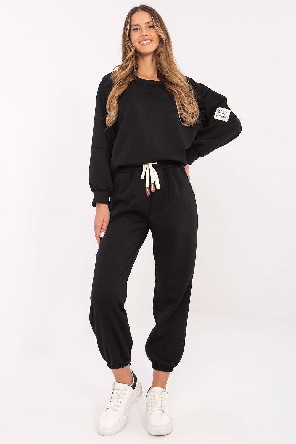 Women's black tracksuit set, crew sweatshirt and jogger pants with drawstring