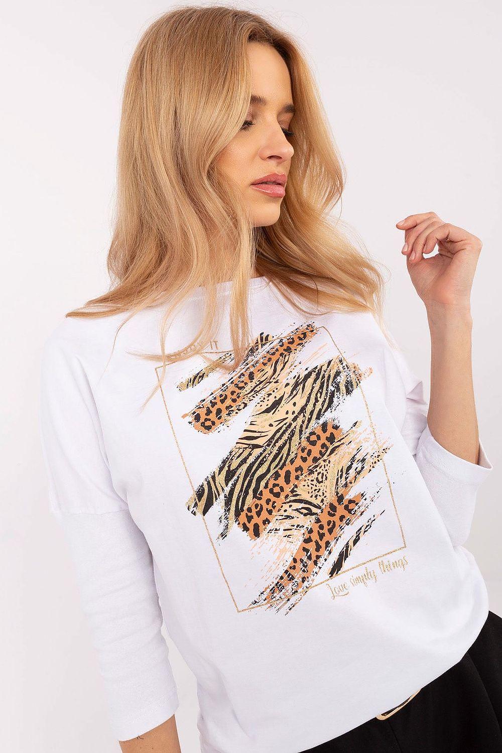 White blouse with three-quarter sleeves and graphic leopard print on front