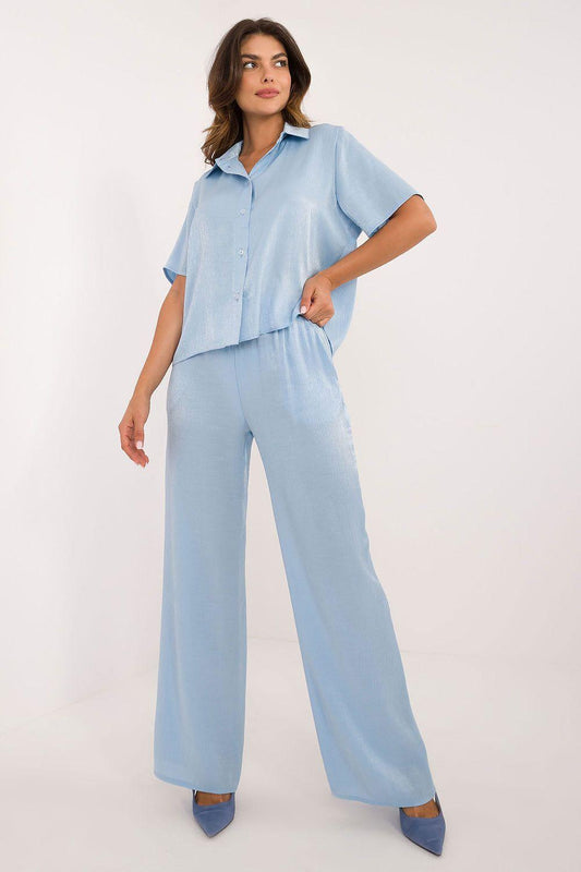 Two-piece outfit set in light blue: short-sleeve button-front top and wide-leg pants