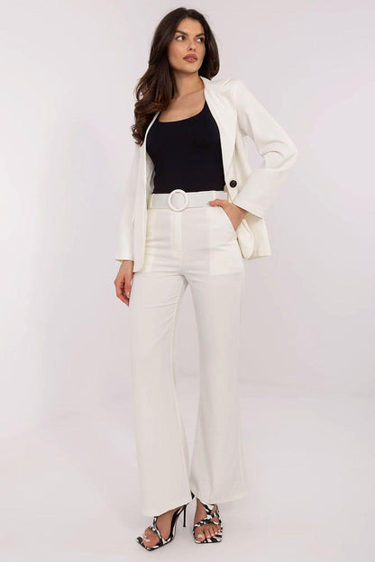 White high-waist trousers with round-buckle belt and straight wide legs