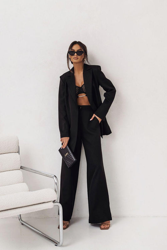 Black blazer and wide-leg pants set with open front and long sleeves
