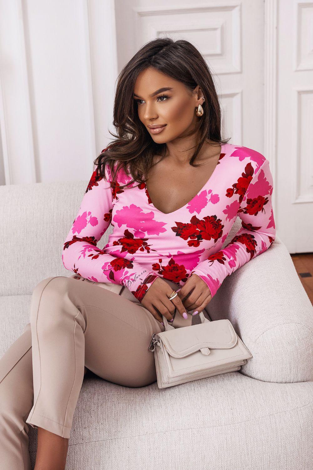 Long-sleeve V-neck blouse with pink floral print and gathered neckline