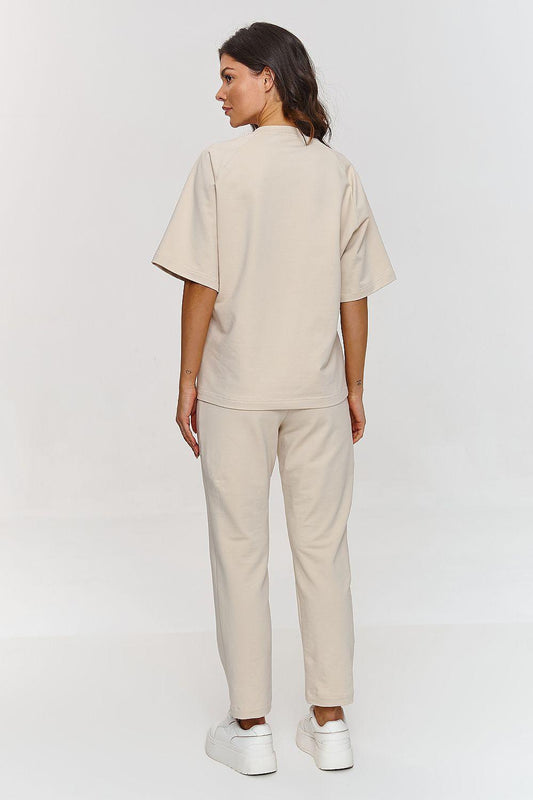 Beige two-piece lounge set with short-sleeve tee and tapered jogger pants, back view