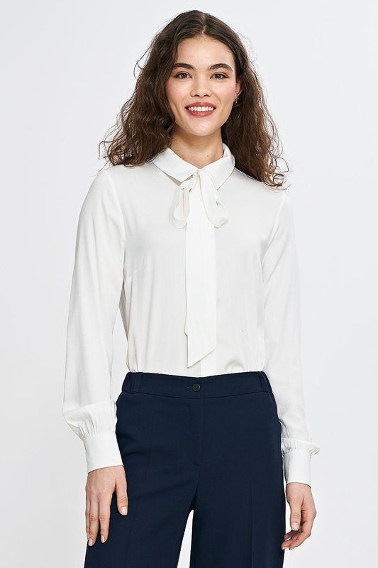 White button-up shirt with bow tie neck, long sleeves and buttoned cuffs