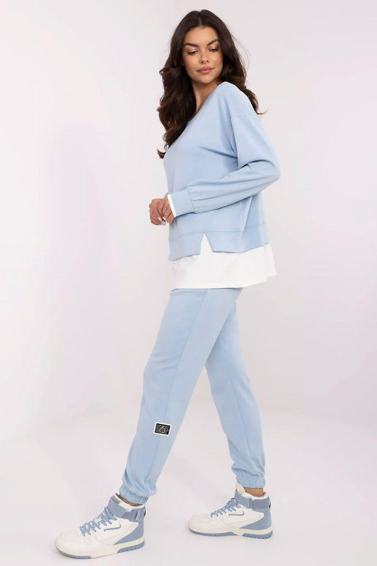 Blue sweatshirt and jogger set, crewneck pullover and cuffed pants with logo patch