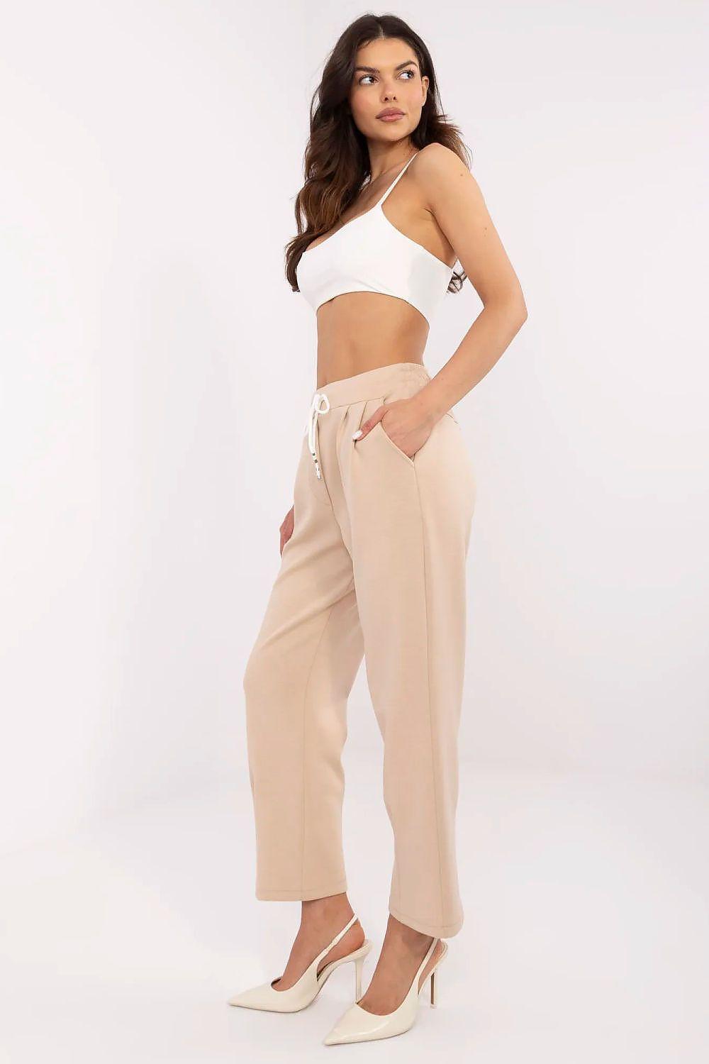 High-waist beige tracksuit trousers with drawstring waist and cropped length