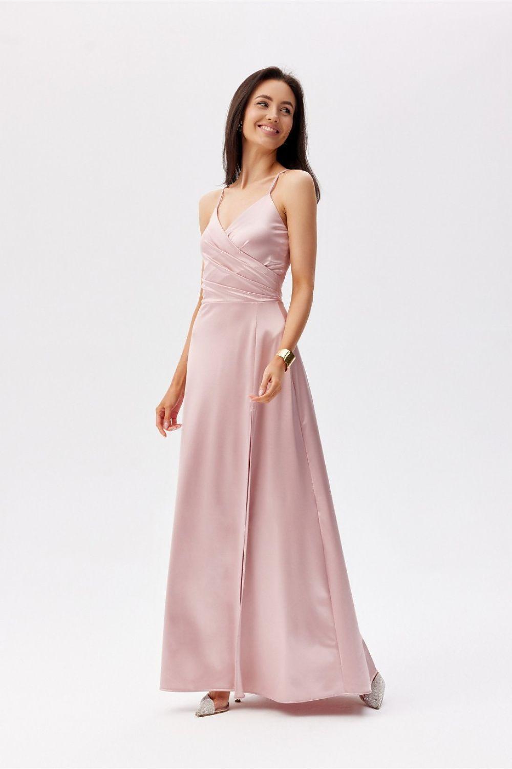 Pink satin long dress with spaghetti straps, ruched waist, and side slit.