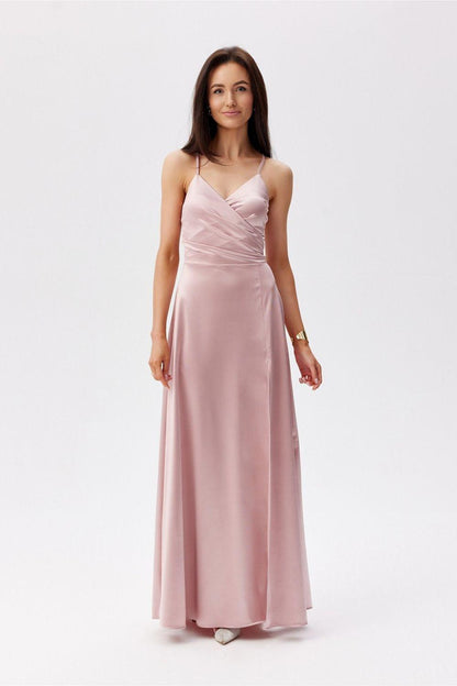 Pink long evening dress with spaghetti straps, ruched detailing, and floor-length skirt.