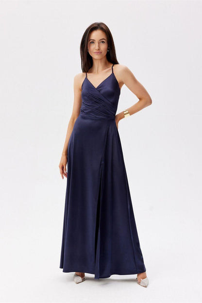 Navy satin long dress with spaghetti straps, ruched waist, and side slit.