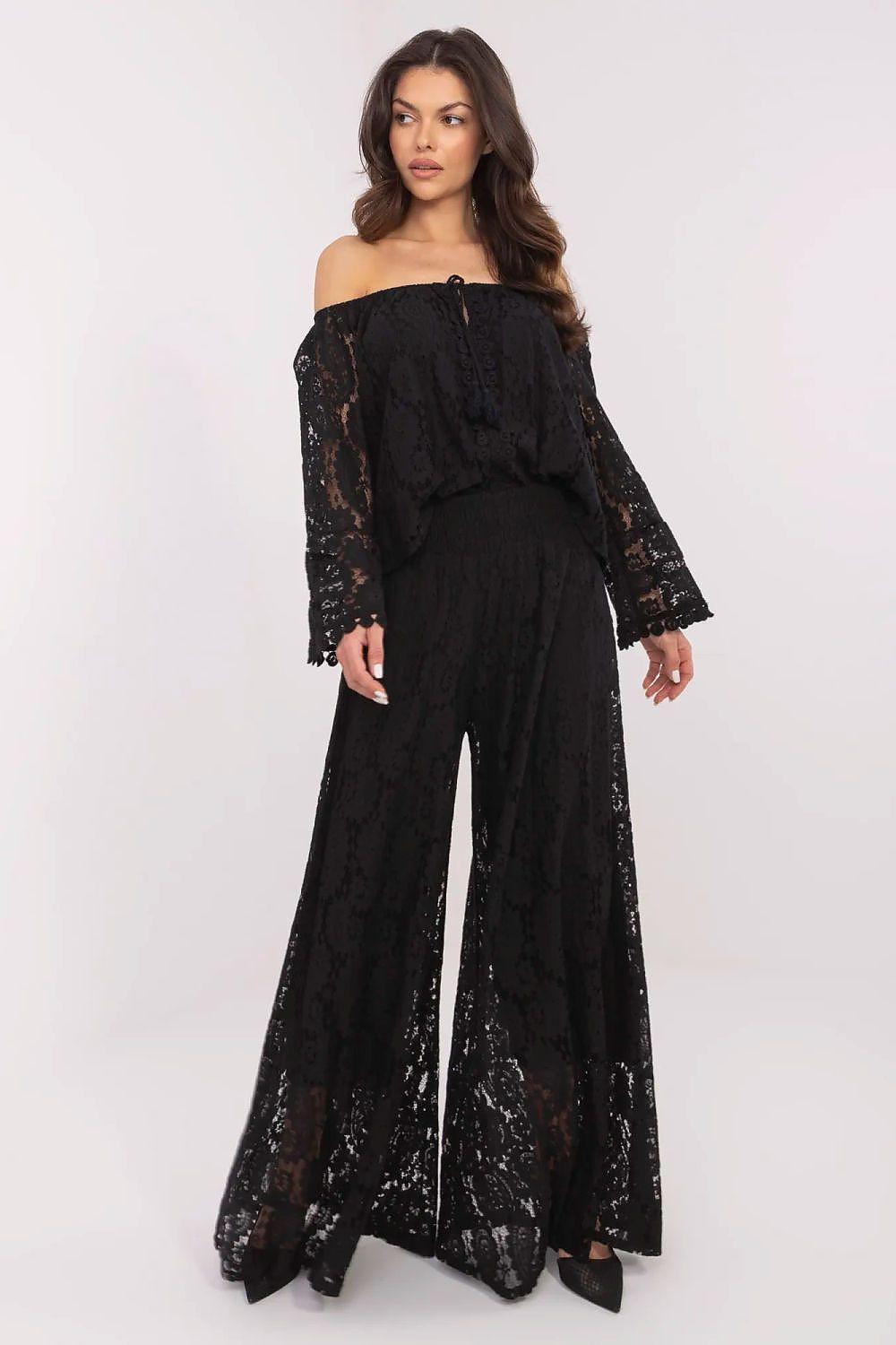 Black lace palazzo trousers with wide, flowy legs