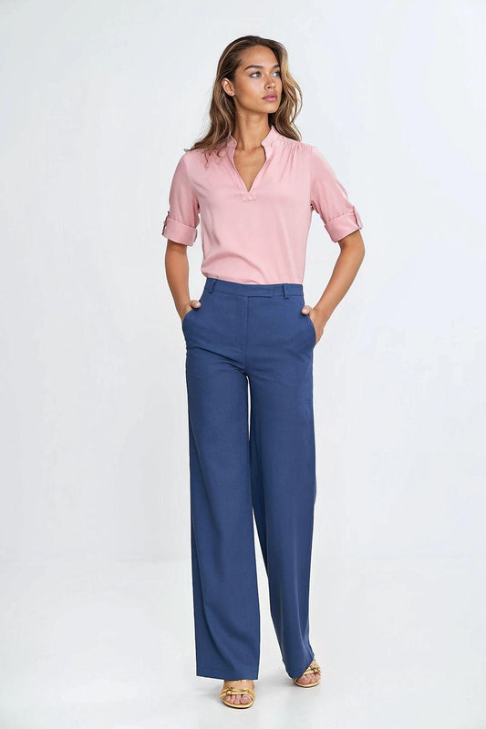 Blue trousers with belt loops and straight legs