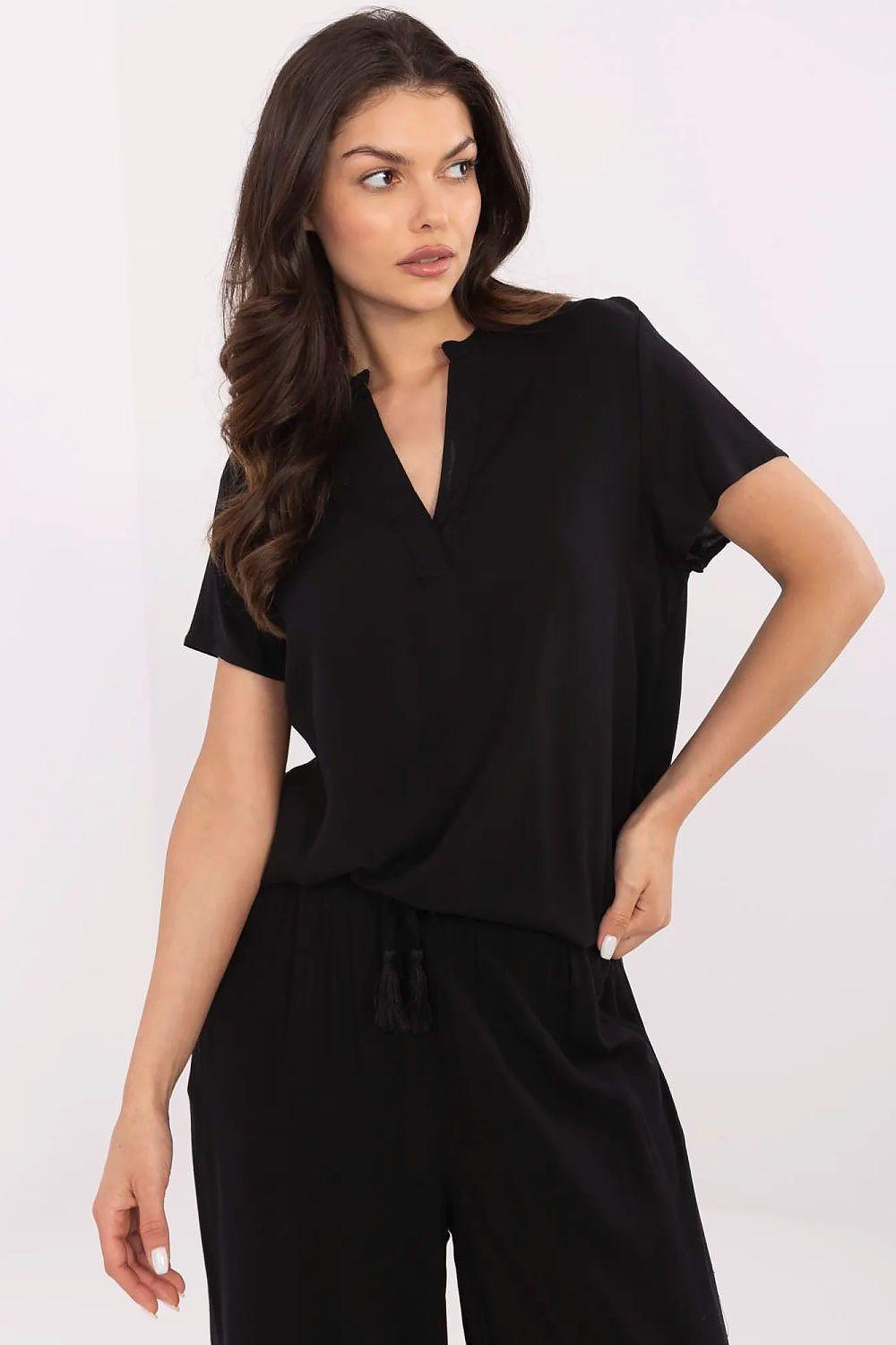Black blouse with V-neck, short sleeves, and gathered waist