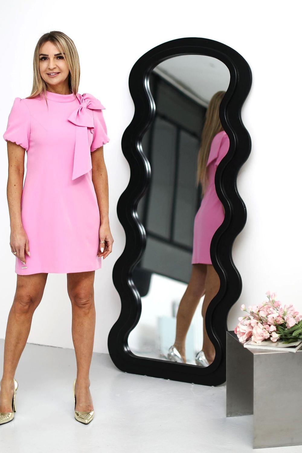 Pink cocktail dress with bow neckline and puff ruffle sleeves, above-knee fit
