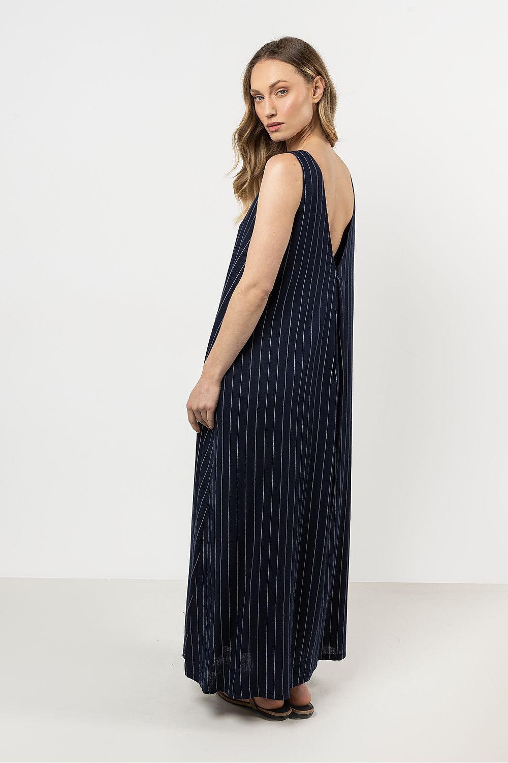 Awama sleeveless daydress in navy blue with vertical pinstripes, back/side view