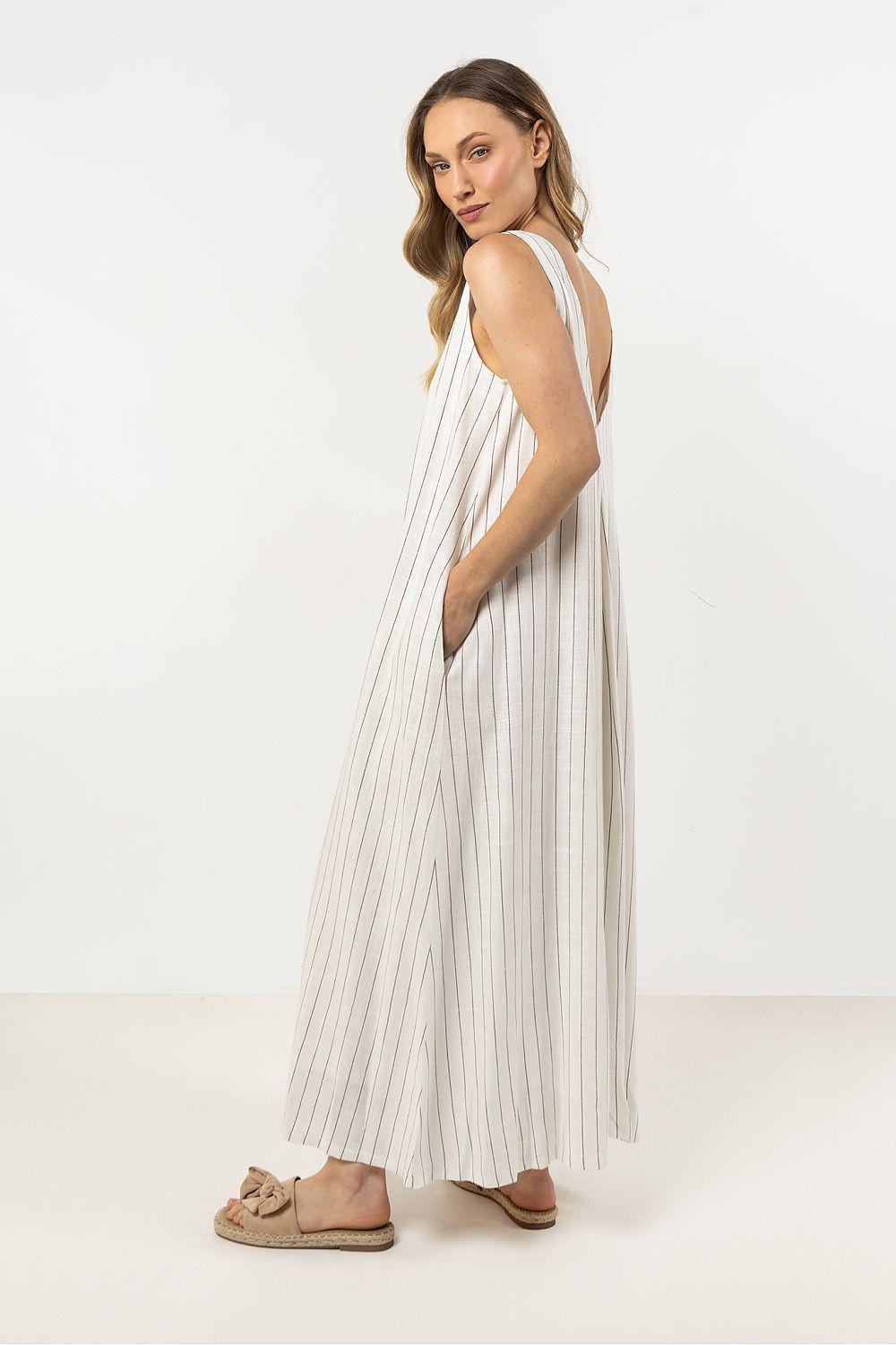 Awama sleeveless daydress in light beige with vertical pinstripes, side view