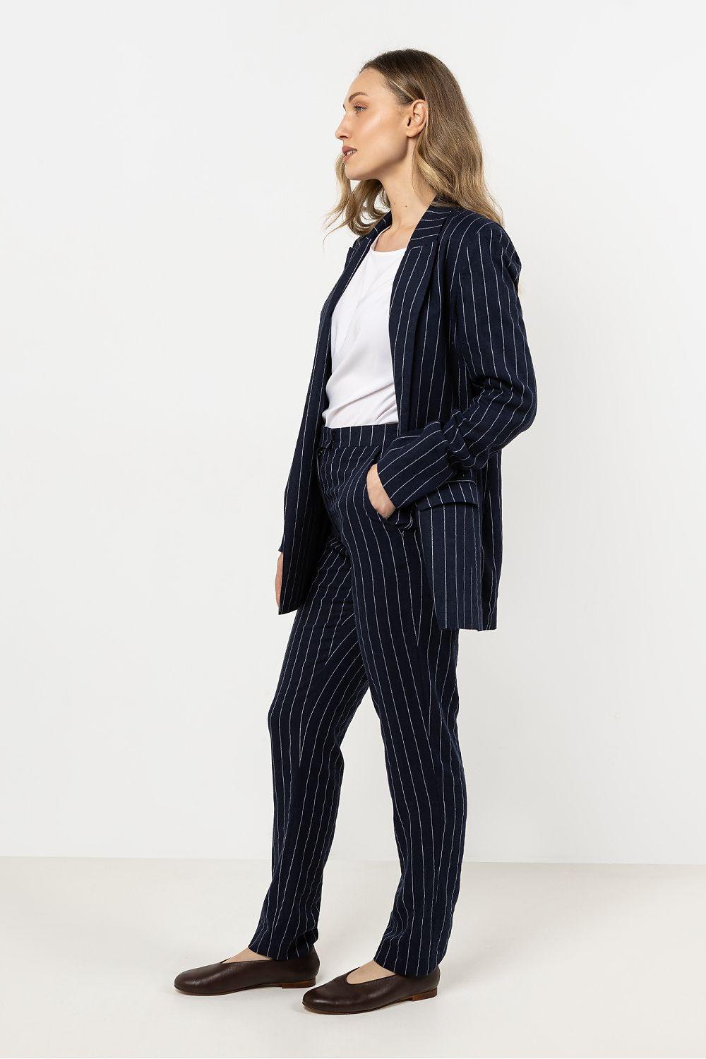 Women’s navy pinstripe trousers, slim fit with side pockets and tapered ankle hem