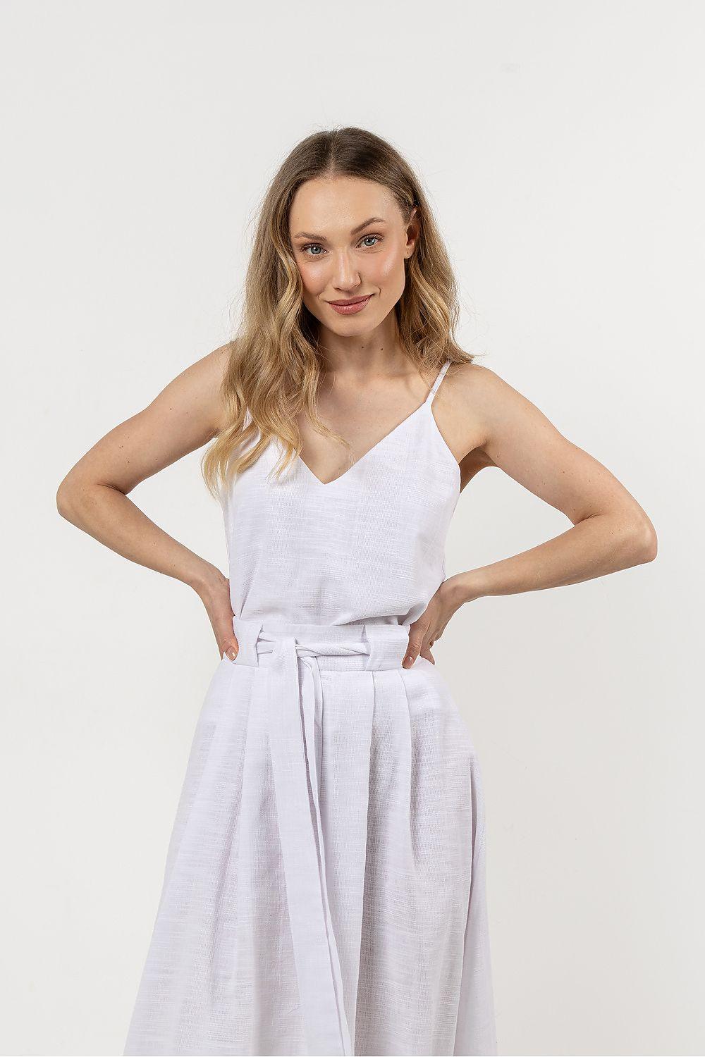 White V-neck spaghetti strap dress with waist tie and belted skirt