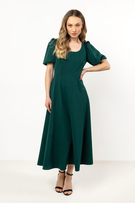 Green daydress with round neckline and short puff sleeves, midi A-line silhouette.