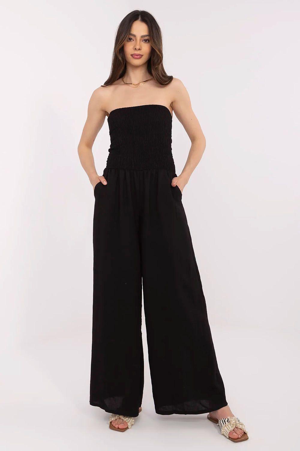 Black strapless wide-leg jumpsuit with smocked bodice and gathered waist