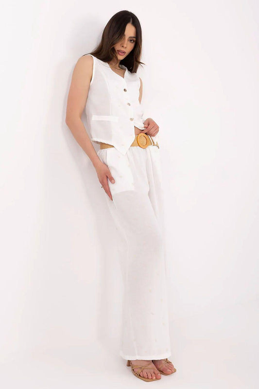 White sleeveless top with button placket and wide-leg pants set