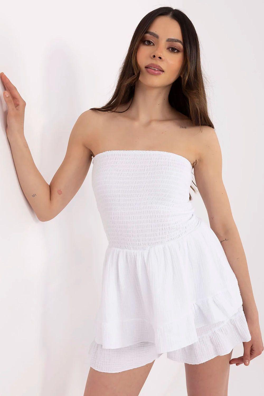 White strapless mini dress with tiered ruffles and textured fabric