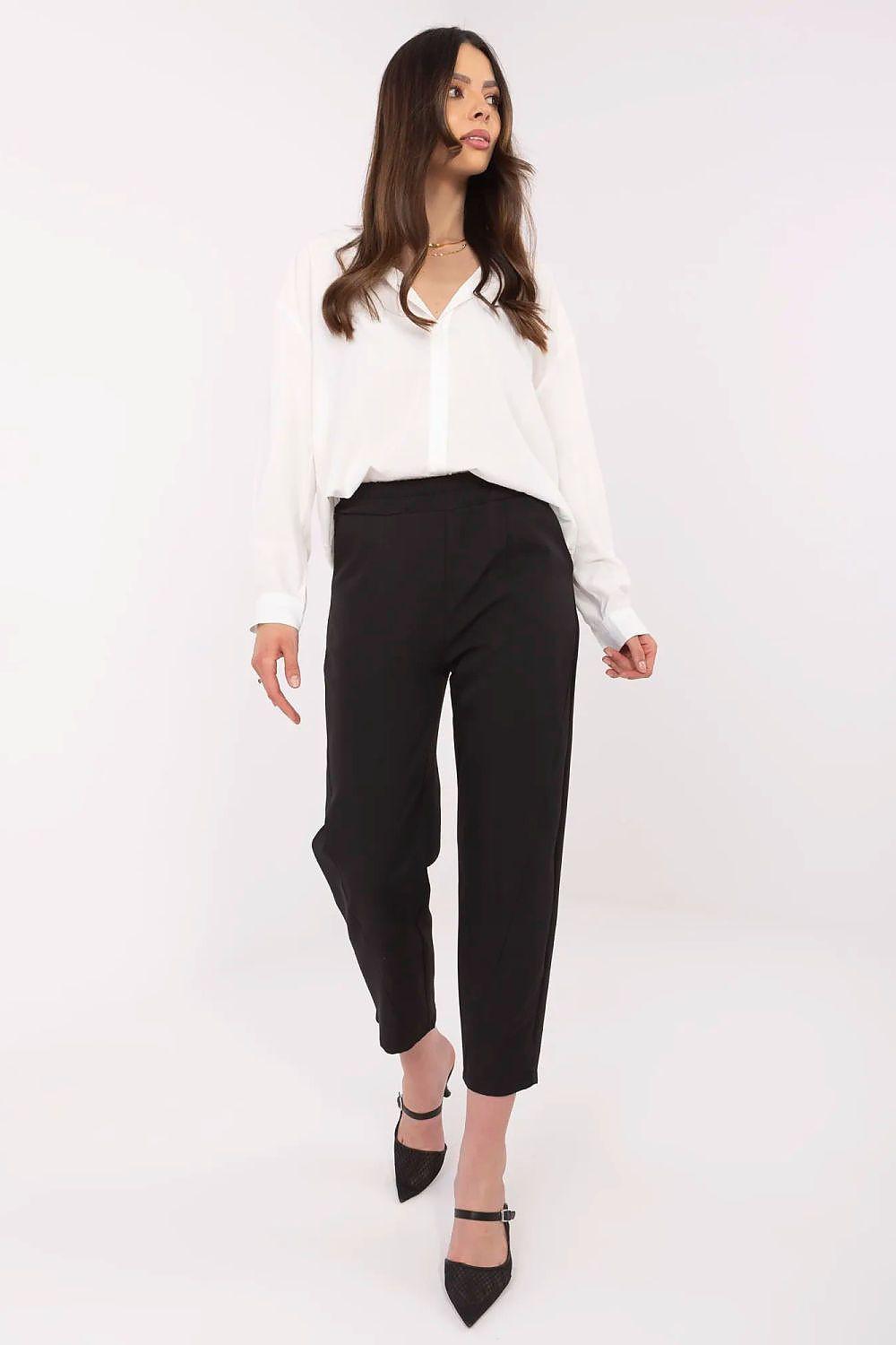 Women's black capri trousers with cuffed hem and tapered leg