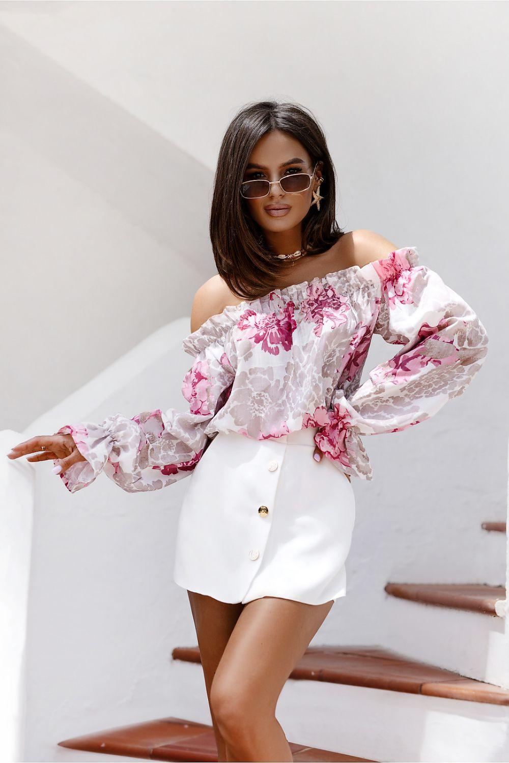 Off-shoulder floral blouse with pink blooms on white, ruffled neckline and long puff sleeves