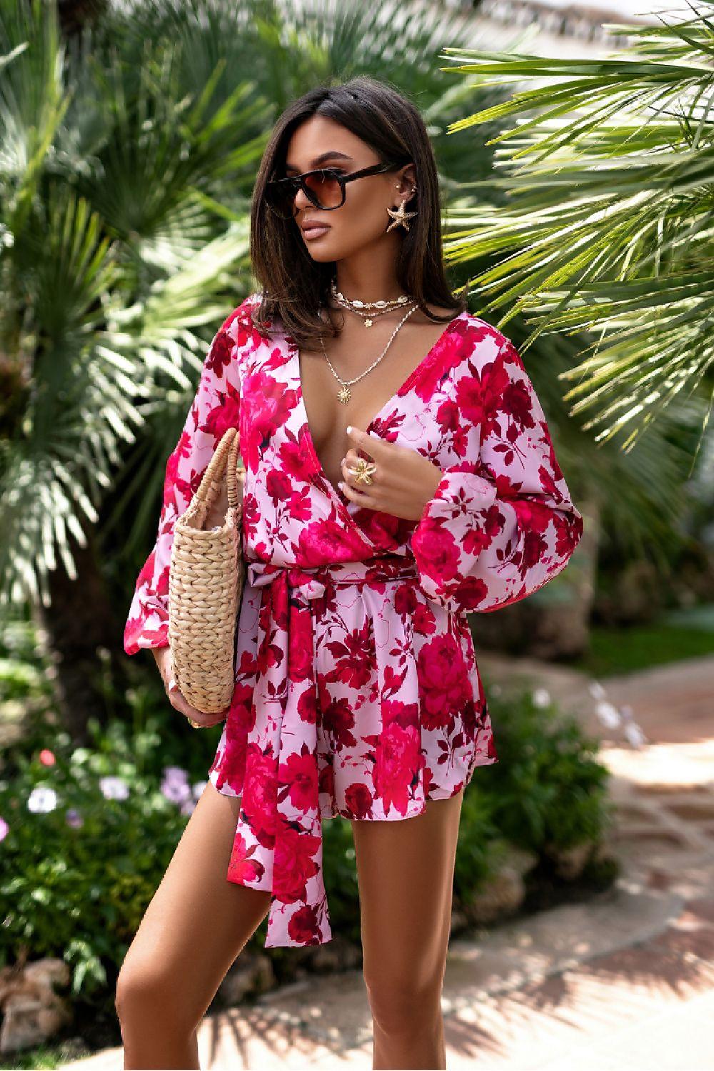 Red floral wrap-front playsuit with long sleeves and belted waist