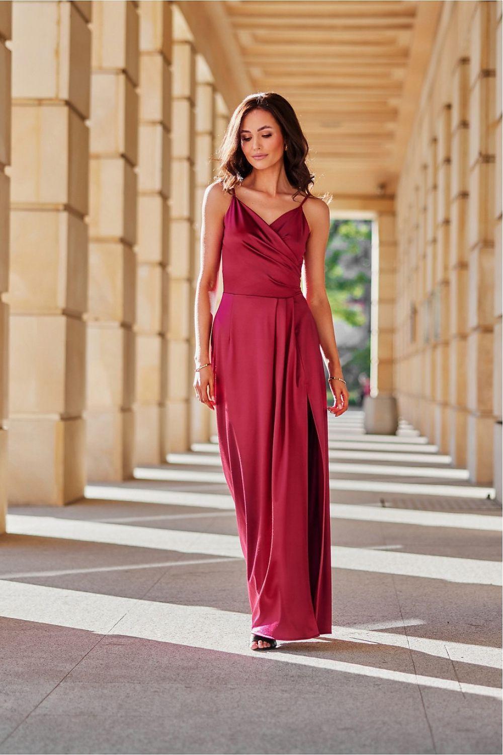 Burgundy long dress with V-neck spaghetti straps, draped waist and flowing skirt