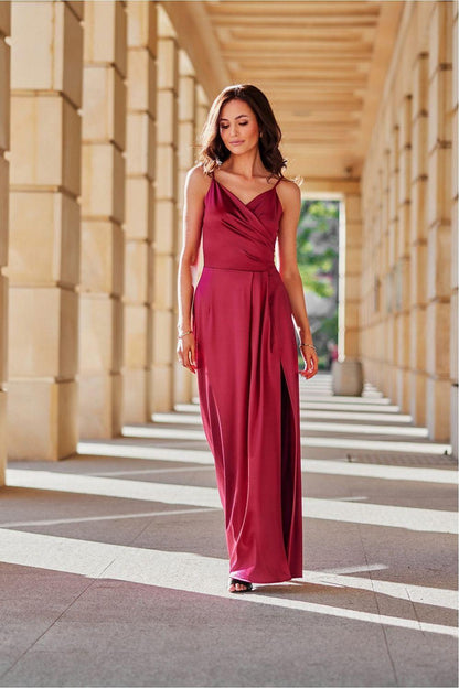 Burgundy long dress with V-neck spaghetti straps, draped waist and flowing skirt