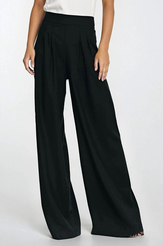 High-waist black wide-leg trousers with pleated front and long flowing legs