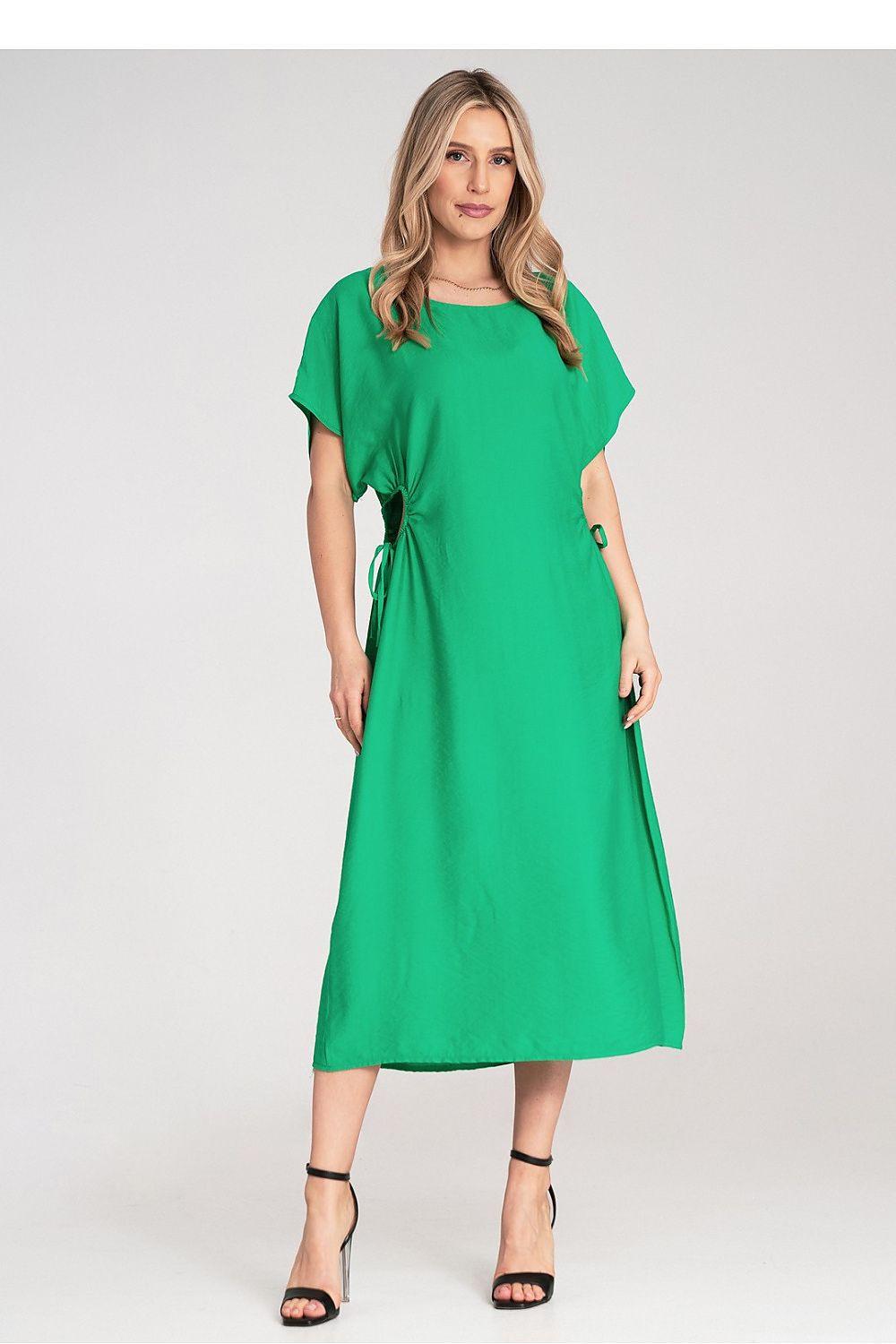 Green daydress with short sleeves, round neck, and tied side ruching, midi length.