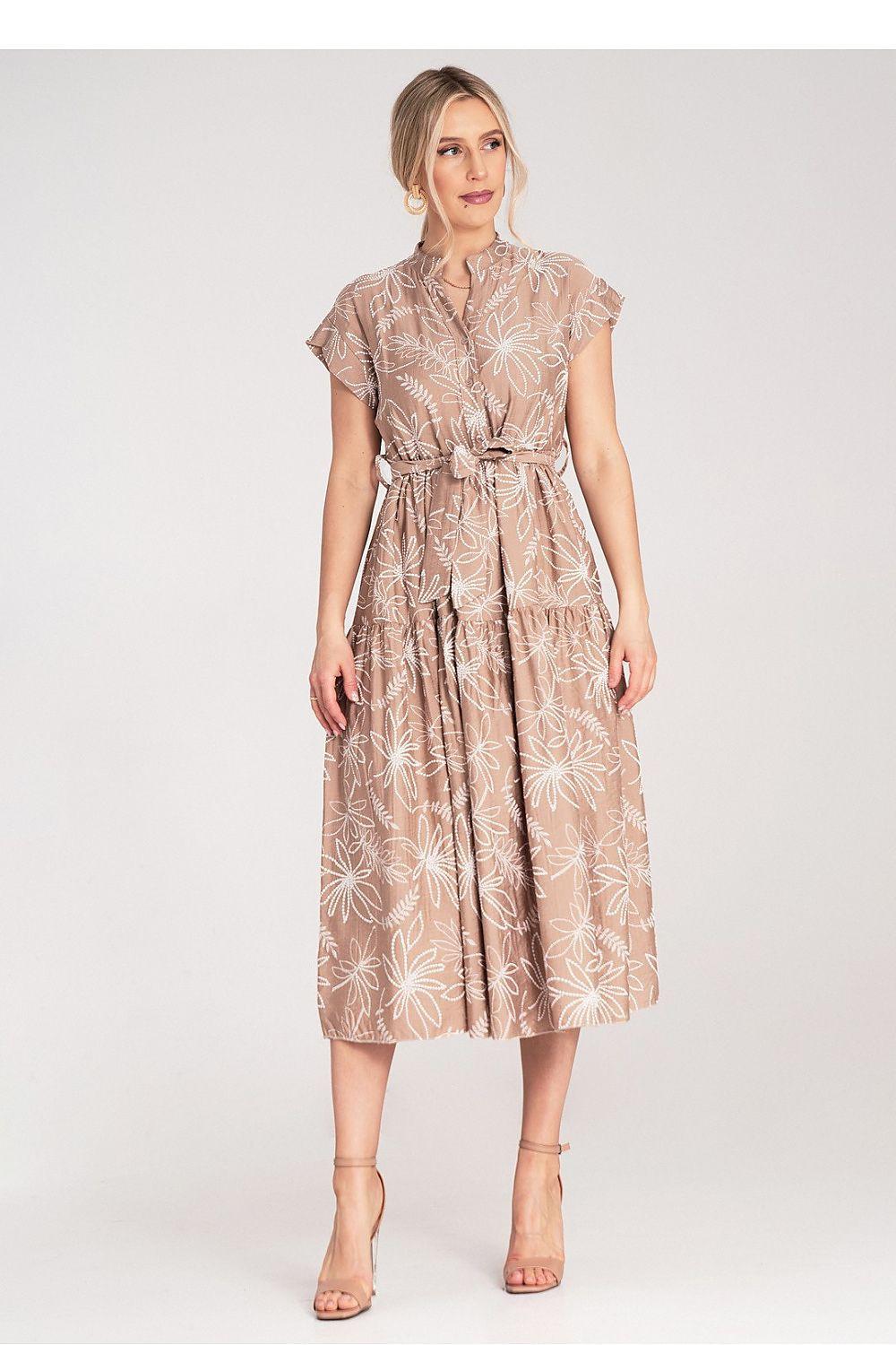 Brown leaf-print daydress with short sleeves, buttoned collar, and tie waist belt