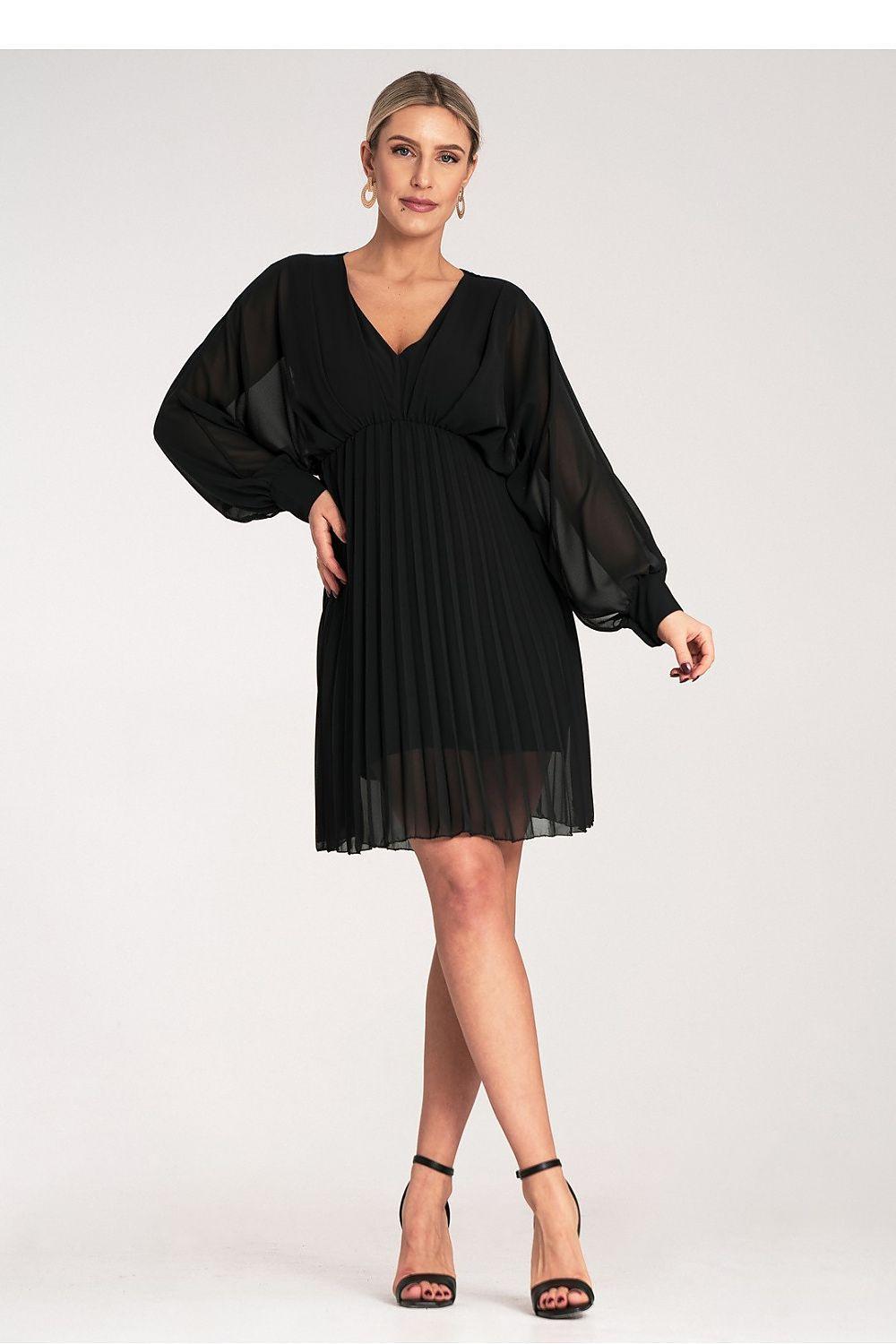 Black cocktail dress with V-neck, long puff sleeves, pleated skirt and sheer hem