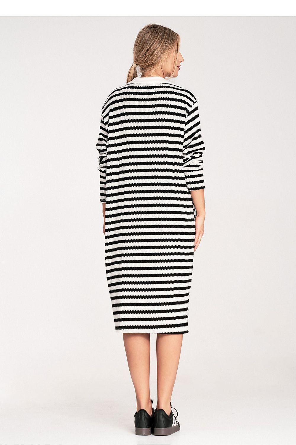 Striped knitted daydress, long sleeves, collared neckline, black-and-white stripes (back)