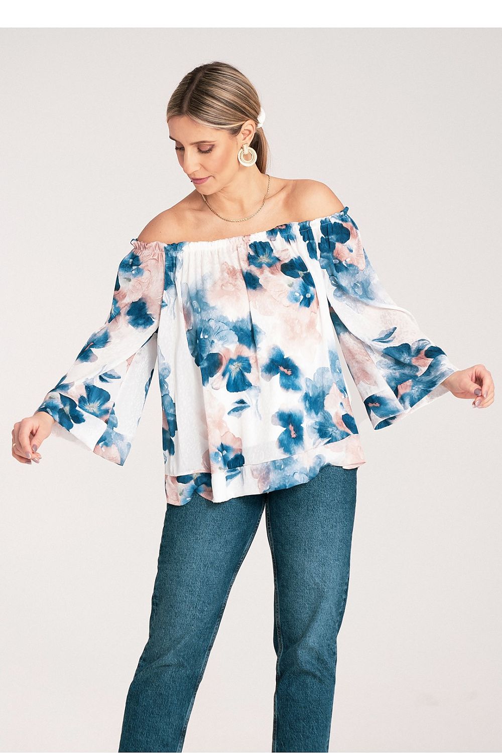 Off-shoulder floral blouse in blue watercolor print with long billowy sleeves