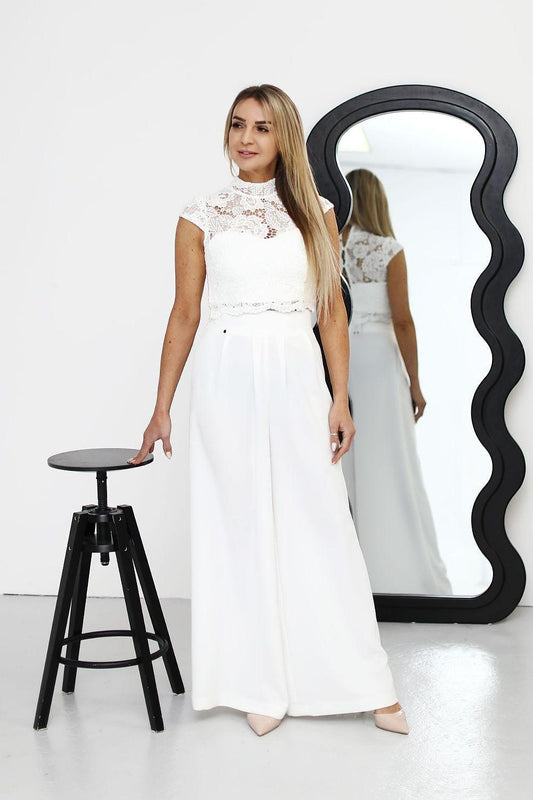 Women's wide-leg trousers set with white lace sleeveless top and long flowy pants