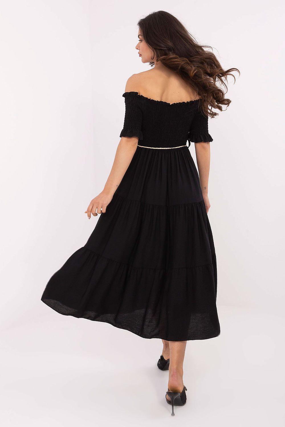 Black off-shoulder tiered daydress, smocked neckline and flowy skirt