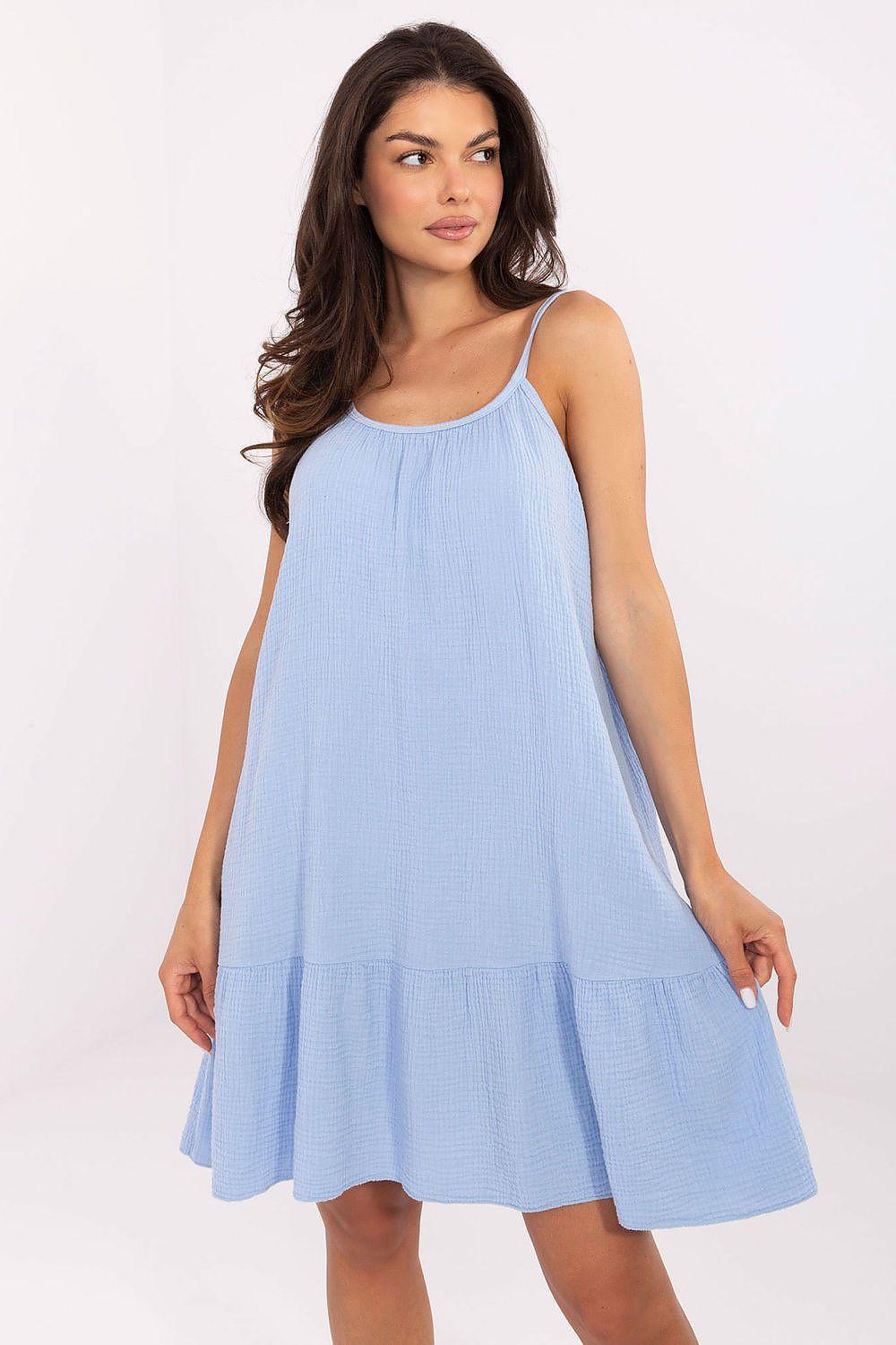 Blue cotton muslin daydress with ruffle hem and tie-back shoulder straps