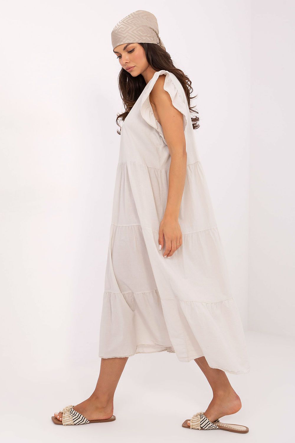 White cotton midi daydress with tiered skirt and frill cap sleeves, side view