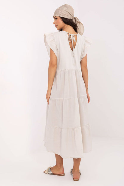 White cotton midi daydress with tiered skirt and frill cap sleeves, back view