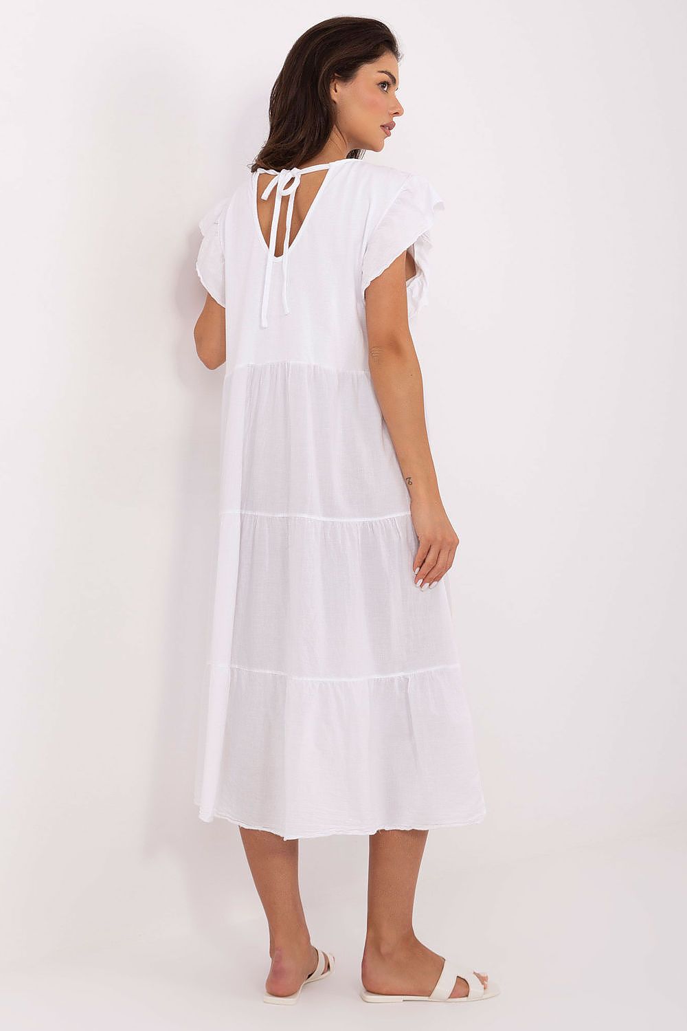White cotton midi daydress with tiered skirt and frill cap sleeves, back side