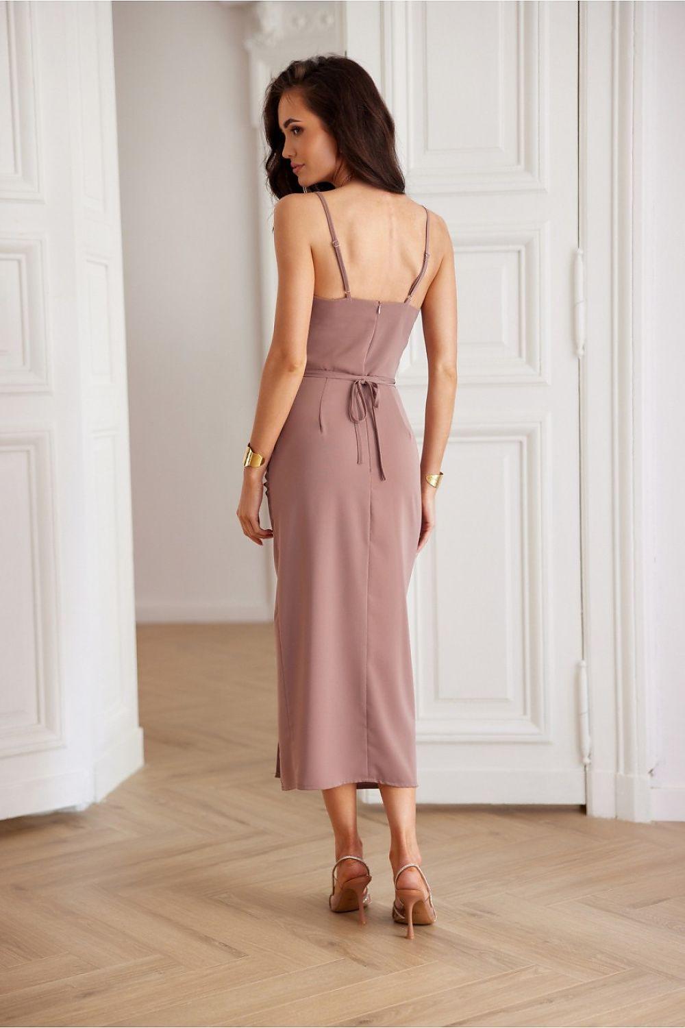 Back view of sleeveless midi cocktail dress with thin straps, ruched waist, blush pink.