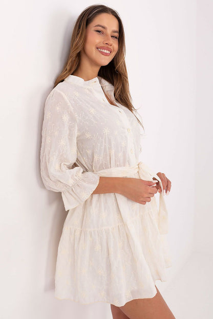White cotton embroidered flare mini dress with button-front bodice and self-tie belt